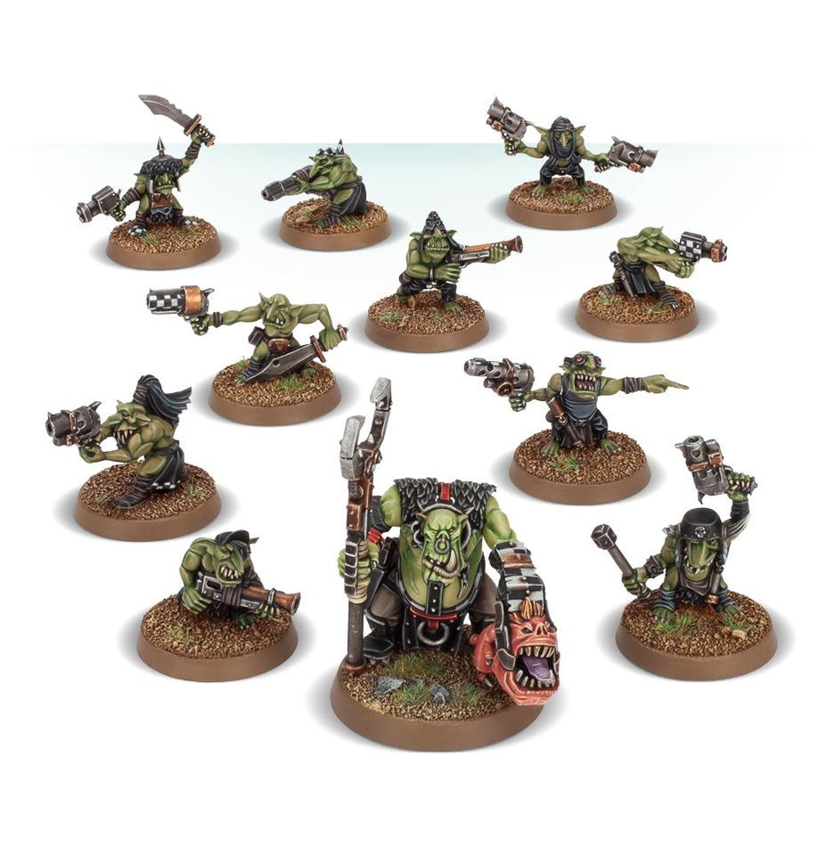 Warhammer 40K Orks Runtherd And Gretchin set of painted multipart plastic Ork and Gretchin miniatures on bases.