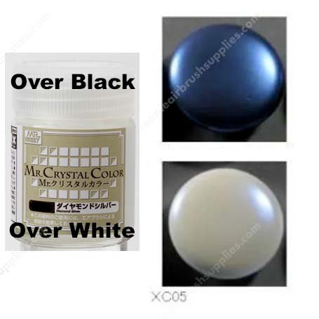 Mr Crystal Color Sapphire Blue showing vivid metallic sapphire hue over black and pearl shimmer over white base.