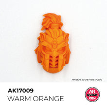 AK Interactive Quick Gen Warm Orange miniature helmet painted in vibrant orange for fantasy and fire effects.