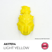 AK Interactive Quick Gen Light Yellow miniature helmet painted in soft yellow with matte finish highlighting fine details.