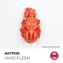 AK Interactive Quick Gen Vivid Flesh miniature helmet painted with bright, warm flesh tone for stylized figures.