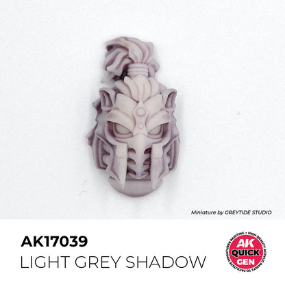 AK Interactive Quick Gen Light Grey Shadow shows subtle shading on a sci-fi miniature helmet with a matte finish.