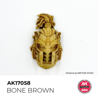 AK Interactive Quick Gen Bone Brown on detailed miniature helmet showing muted matte earthy tone for aged bone effects