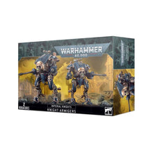 Warhammer 40K Imperial Knights Knight Armigers painted models with blue armor and heavy weaponry on round bases.
