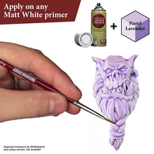 The Army Painter Speedpaint Pastel Lavender being applied with brush on a primed miniature for one-coat vibrant shading and highlights.