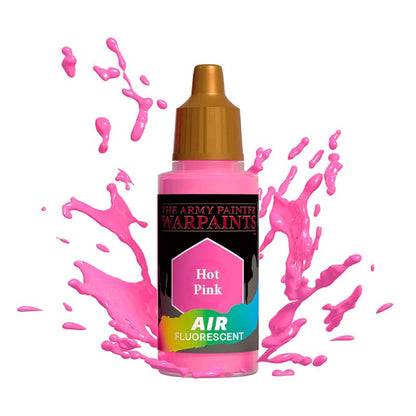 The Army Painter Air Hot Pink fluorescent paint bottle with vibrant pink splashes around it.