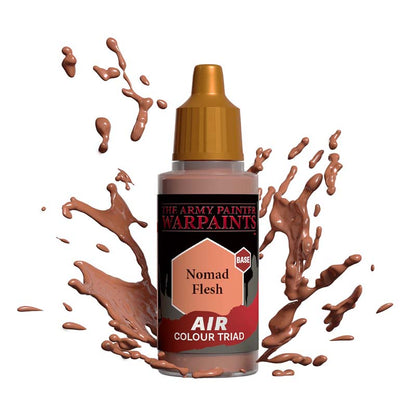 The Army Painter Air Nomad Flesh airbrush paint bottle with splashes of flesh-colored paint around it
