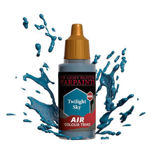 The Army Painter Air Twilight Sky paint bottle with blue paint splashes demonstrating vibrant pigment and smooth flow.
