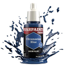 The Army Painter Warpaint Fanatic Ultramarine Blue acrylic paint bottle with splashing strong purplish blue paint.