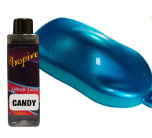 INSPIRE Candy Blue airbrush paint bottle next to glossy custom blue candy paint finish sample for automotive use
