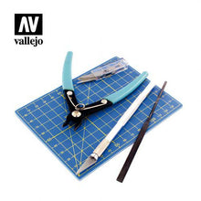 Vallejo 9 Piece Modelling Tool Set with precision cutters, hobby knife, file, cutting mat, and spare blades for model making.