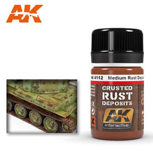 AK Medium Rust Deposit bottle with rust pigment for realistic weathering effects on scale models and miniatures.