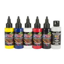 illustration Primary Color Set featuring Createx Colors airbrush paints in yellow, blue, white, red, black, and balancing clear bottle