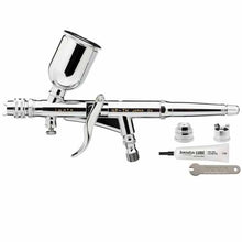 Iwata Hi-Line HP-TH airbrush with dual spray patterns, MAC valve, and accessories for precision painting and detailing.